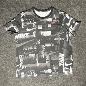 Nike Men’s Black “Swoosh” All Over Print Dri-Fit Shirt